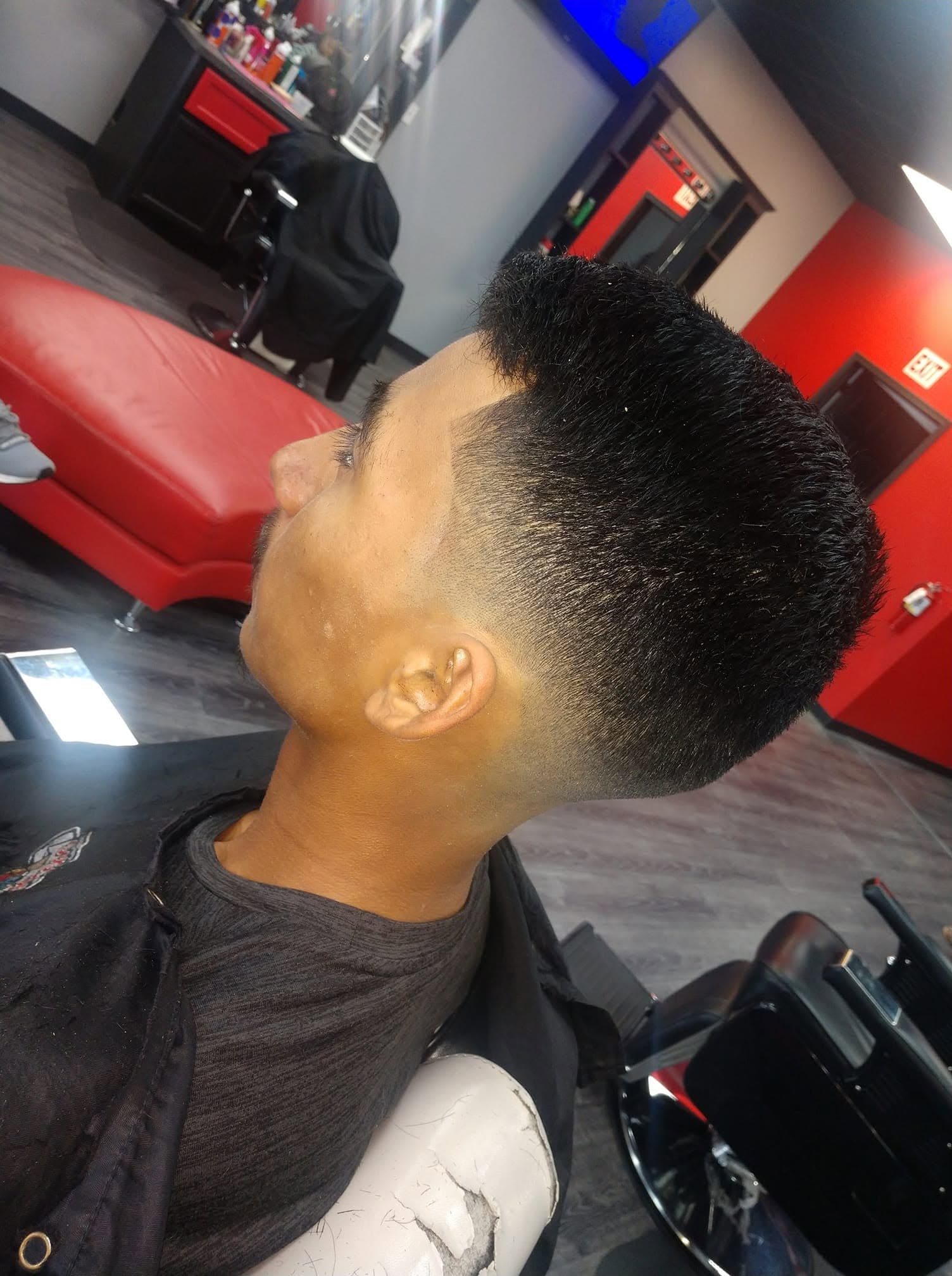 Sharp side part fade